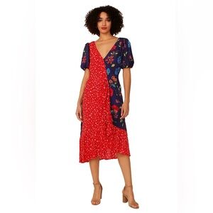 Parker designer dress. Royal blue and red mix. One ruffle side tie Size S WW